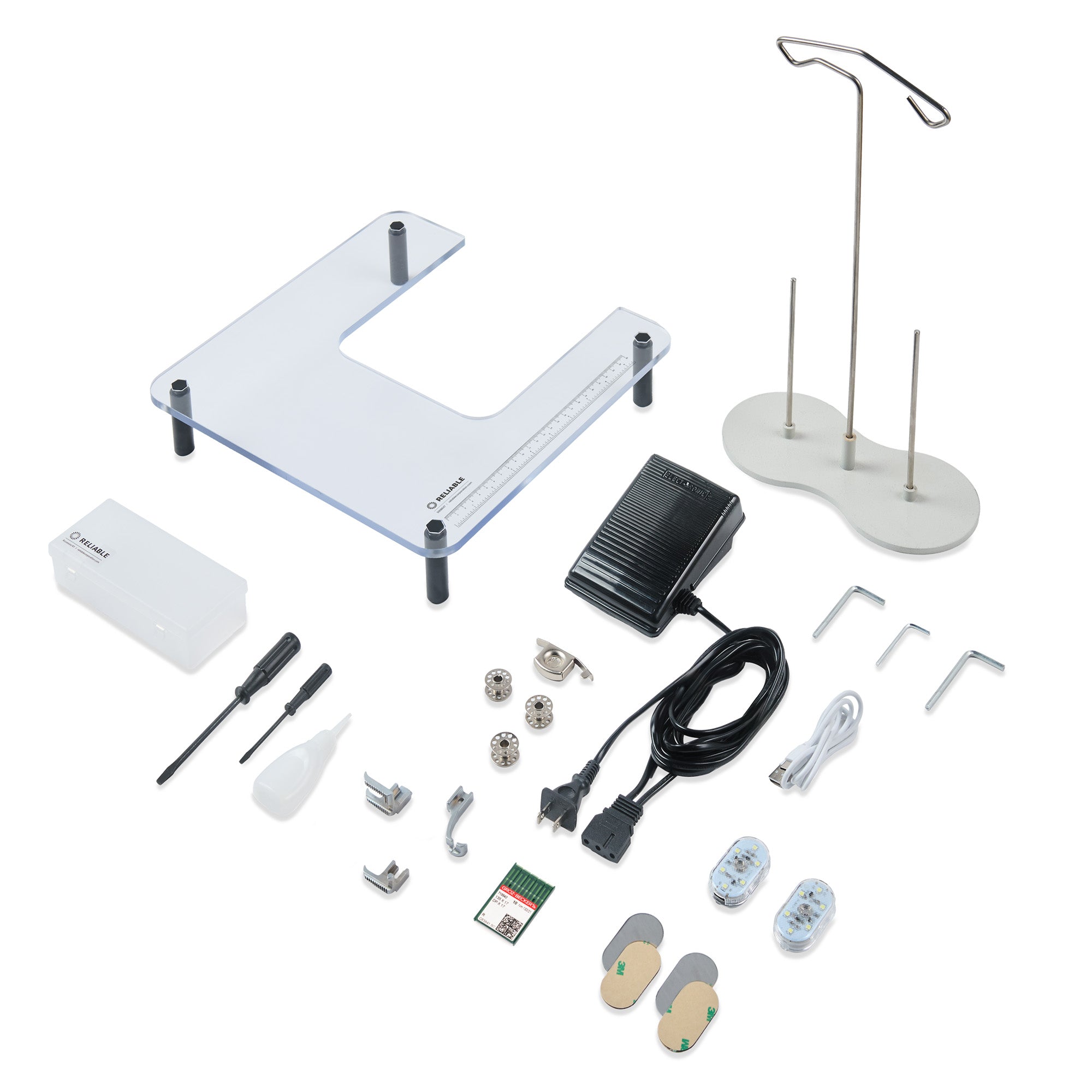 Collection of electronic components and tools on a white background