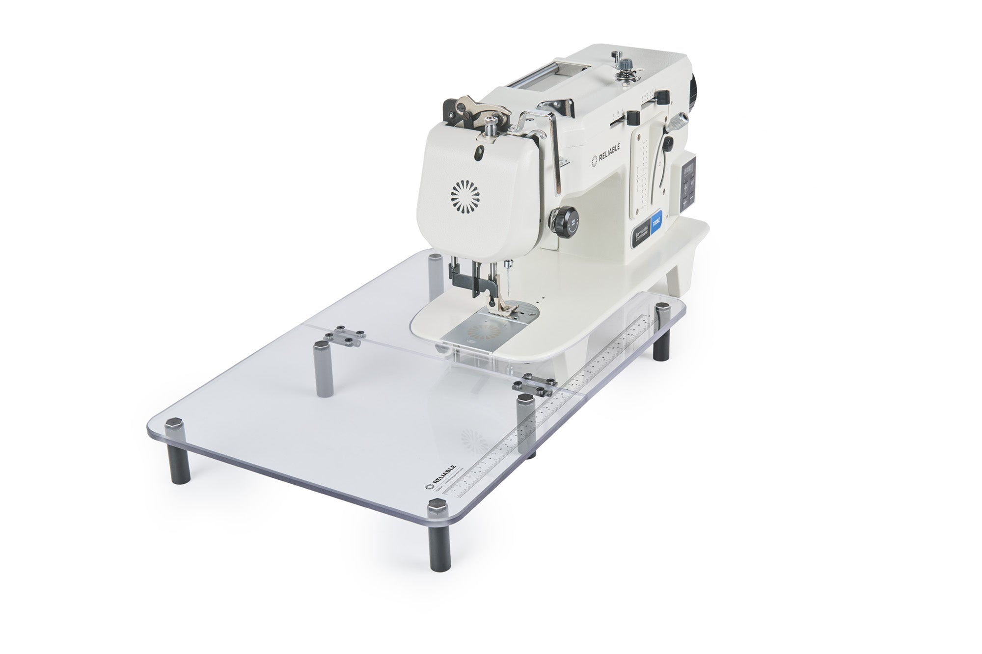 Sewing machine with a clear extension sewing table